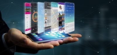 Businessman holding 3d rendering app template on a smartphone