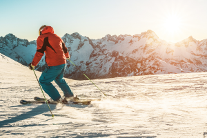 Man Skiing as the sun goes down