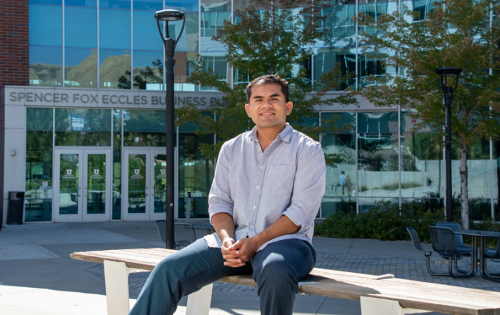 Diego Alvarez sitting outside the David Eccles School of Business