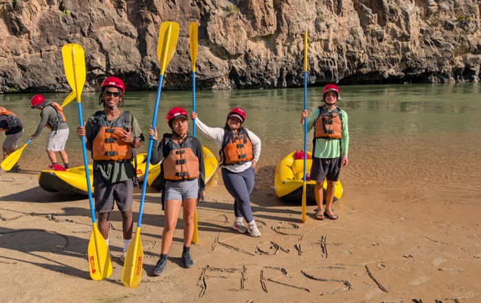 Student in the First Ascent Scholars program rafting