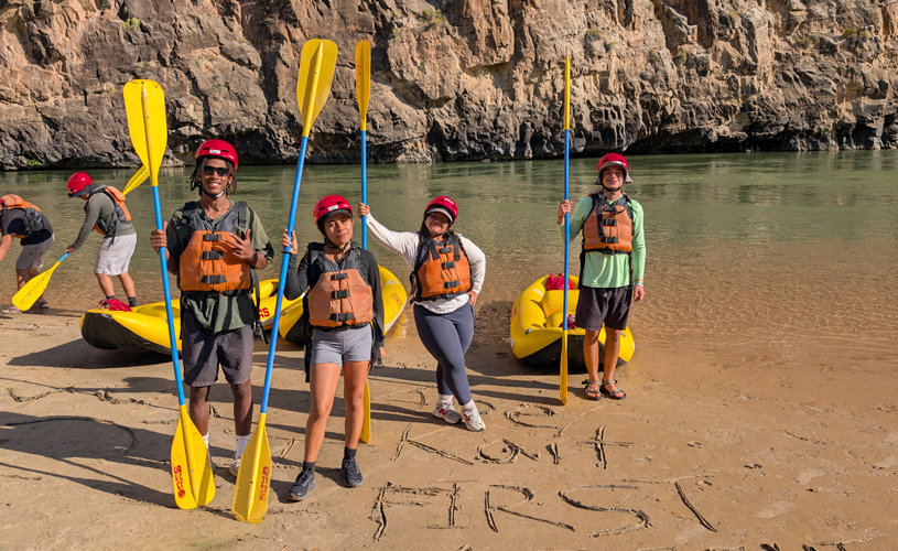 Student in the First Ascent Scholars program rafting