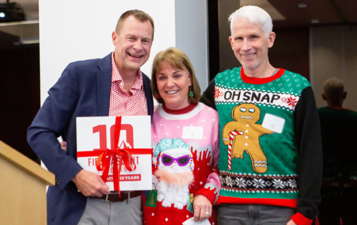 Dean Dirks with Jeff and Helen Cardon at the First Ascent Scholars 10 year event